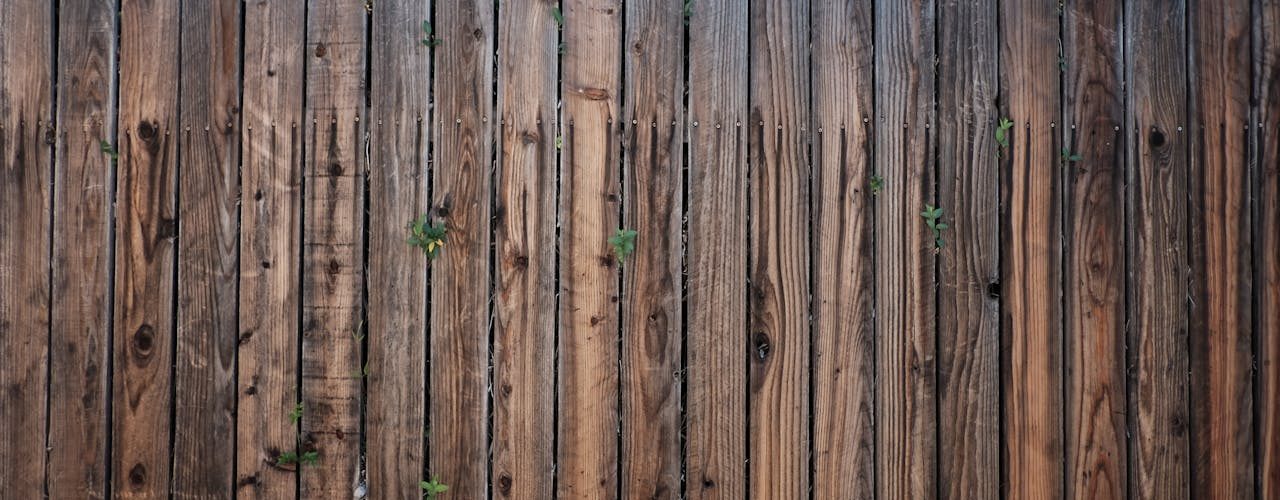 Schanskorven of houten schutting kiezen voor jouw tuin